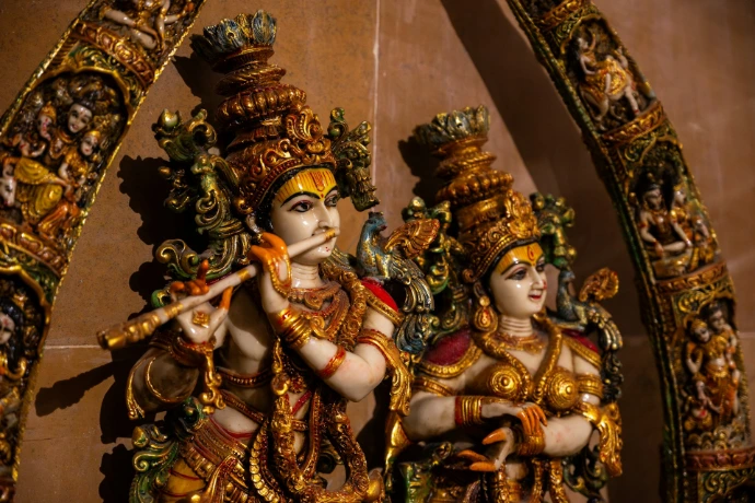 Ornate statues of hindu deities krishna and radha